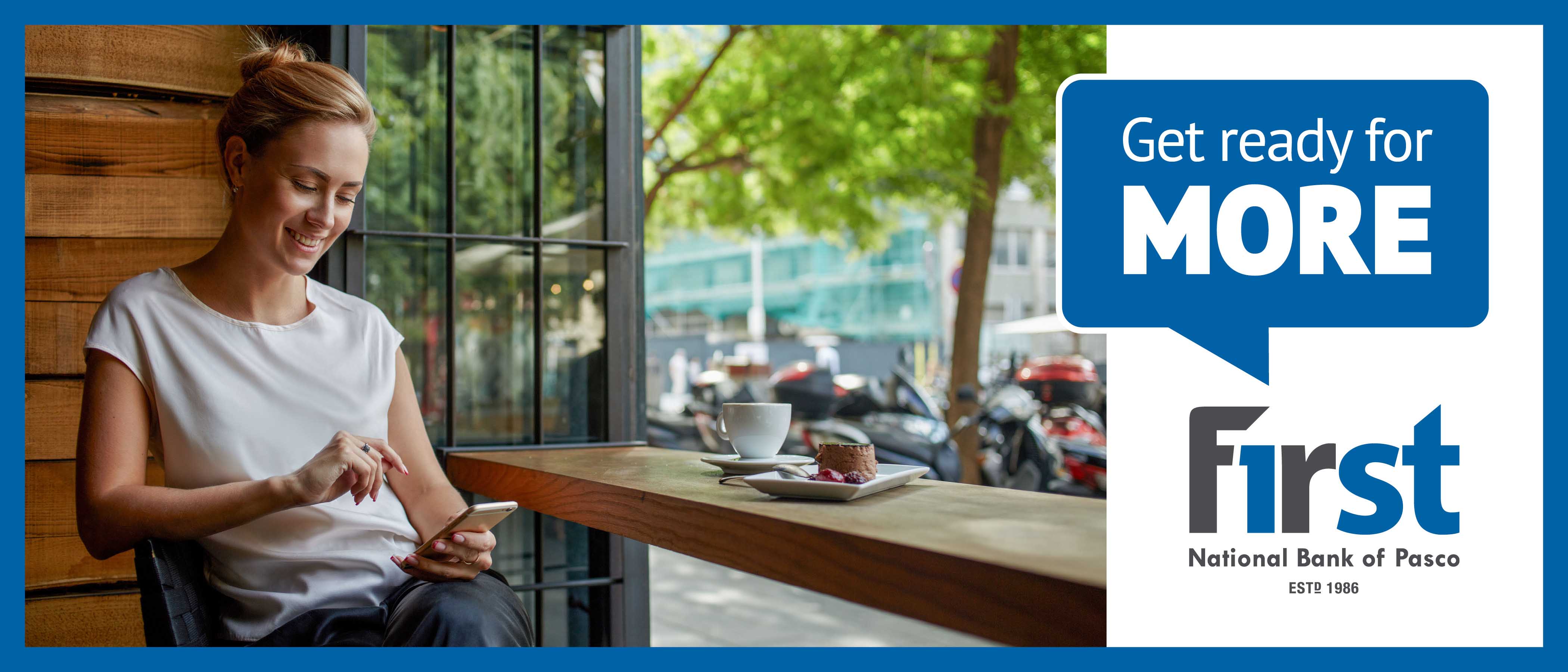 Woman in Coffee Shop Using Digital Banking on Mobile Phone